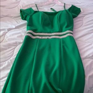 I am selling a green dress.